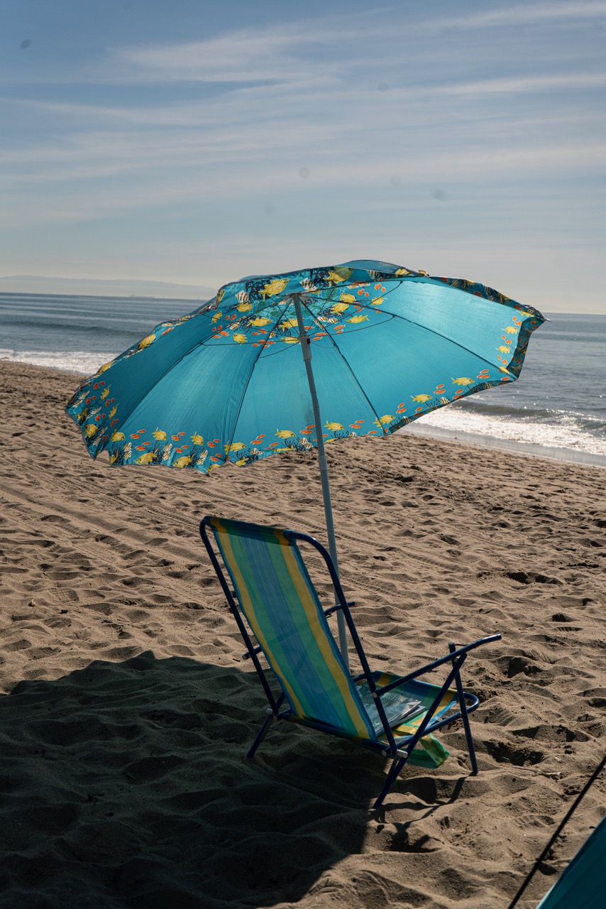 umbrella on beach blue